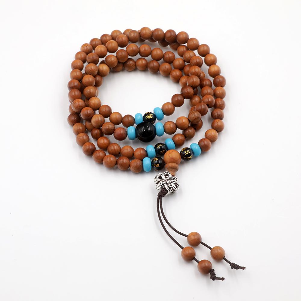 Collier mala de madera de santal, piedra de obsidiana y turquesa