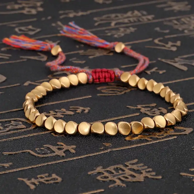 Bracelet tibétain tressé à la main avec perles de cuivre