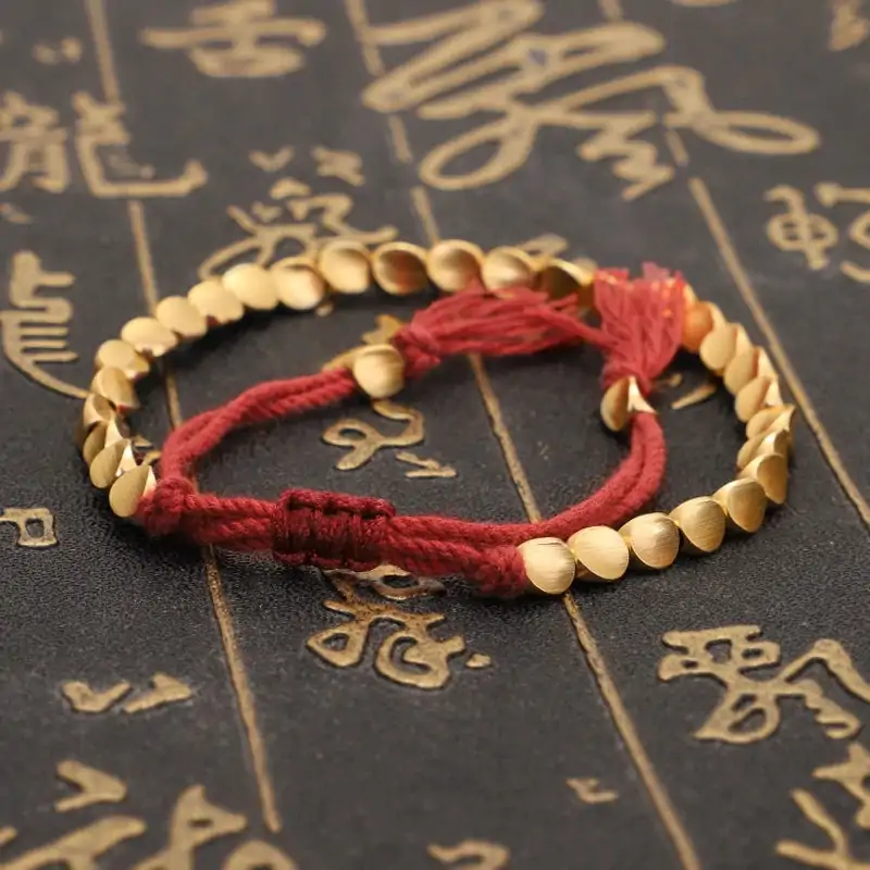 Bracelet tibétain tressé à la main avec perles de cuivre