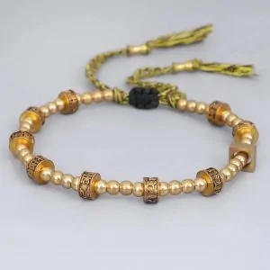 Bracelet tibétain tressé à la main avec perles en cuivre