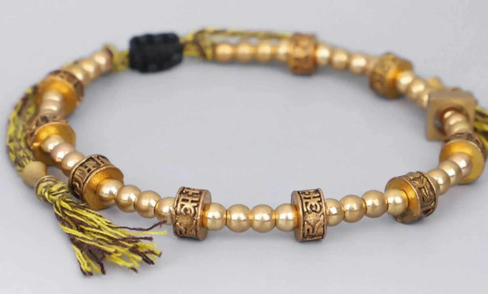 Bracelet tibétain tressé à la main avec perles en cuivre