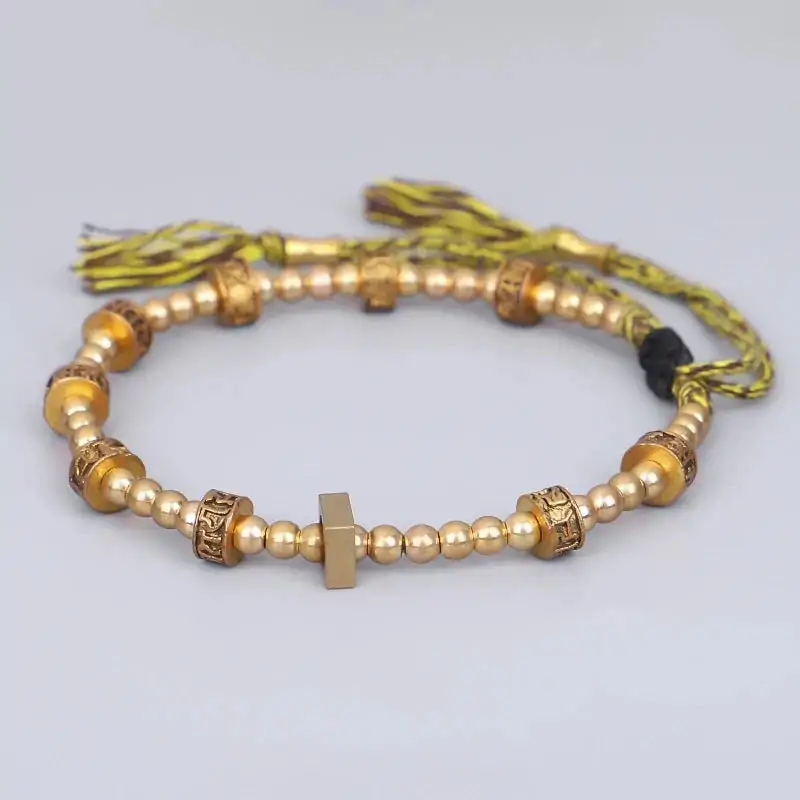 Bracelet tibétain tressé à la main avec perles en cuivre