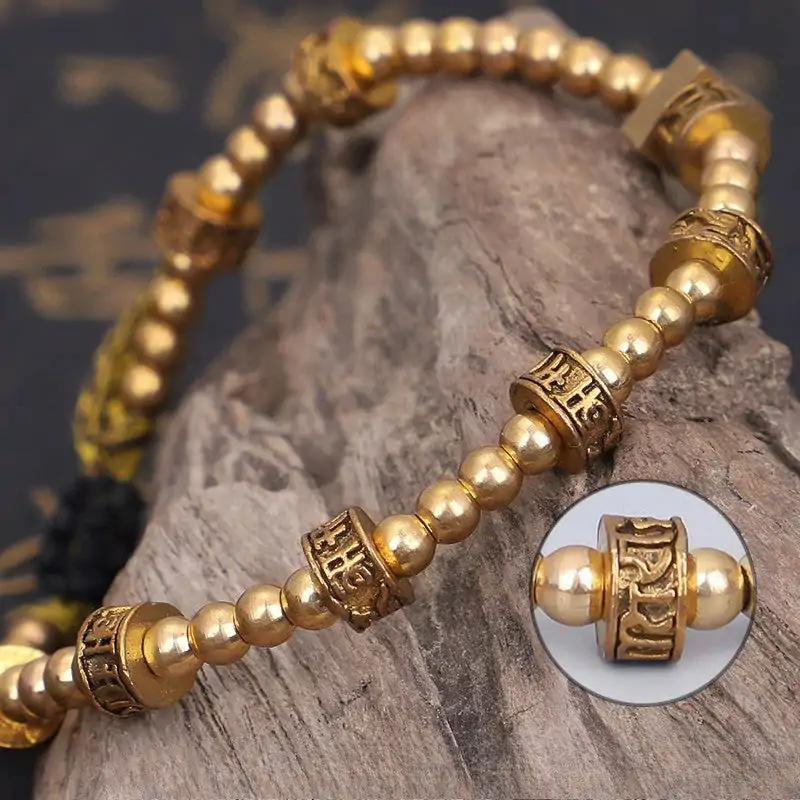 Bracelet tibétain tressé à la main avec perles en cuivre