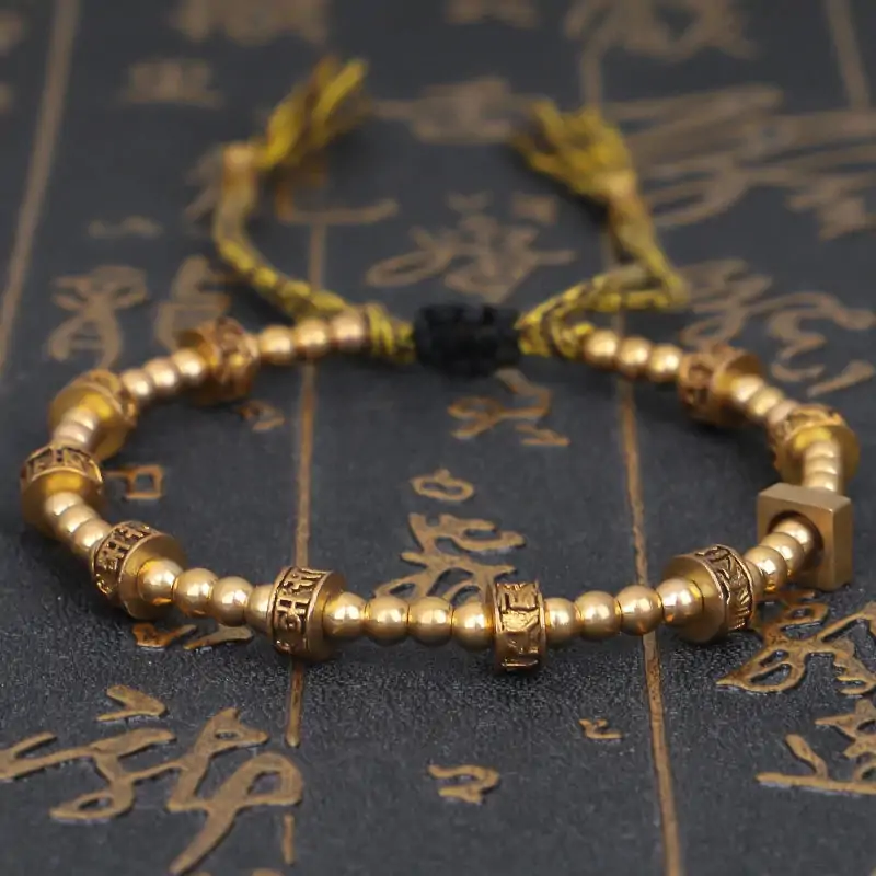 Bracelet tibétain tressé à la main avec perles en cuivre