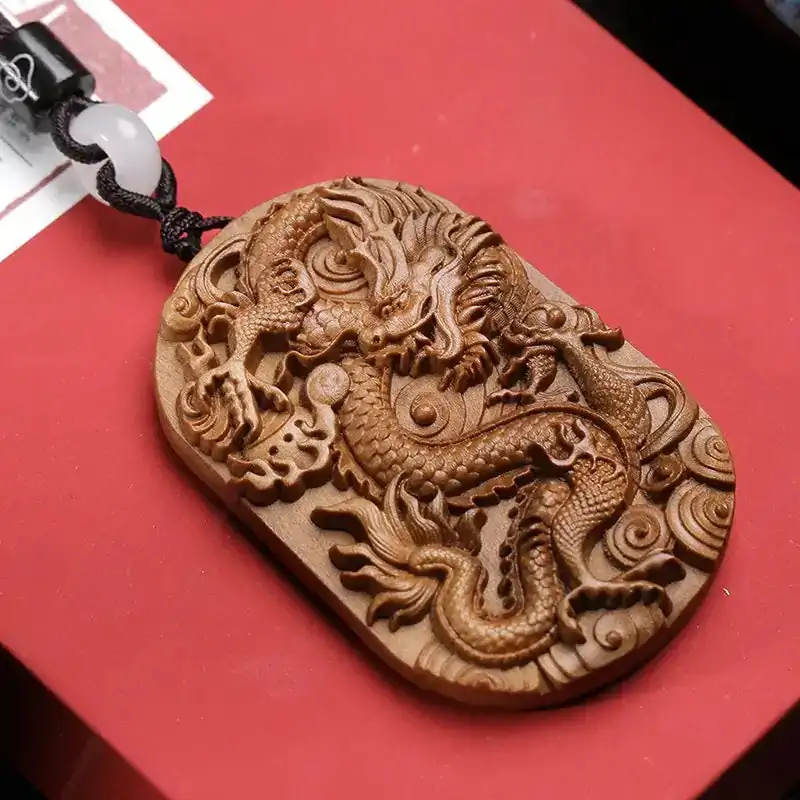 pendentifs amulettes pendentif feng shui dragon bois d