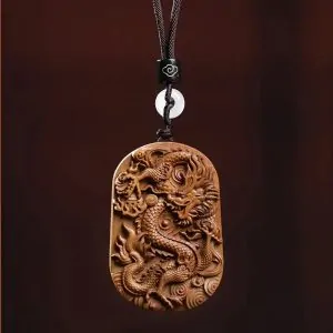 pendentifs amulettes pendentif feng shui dragon bois d