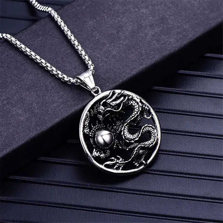 pendentifs amulettes pendentif rond dragon acier inoxy