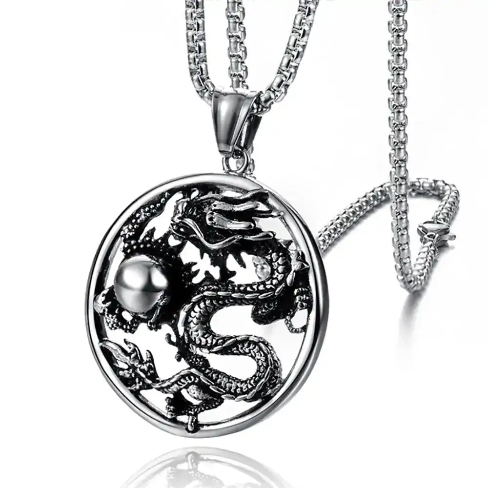 pendentifs amulettes pendentif rond dragon acier inoxy