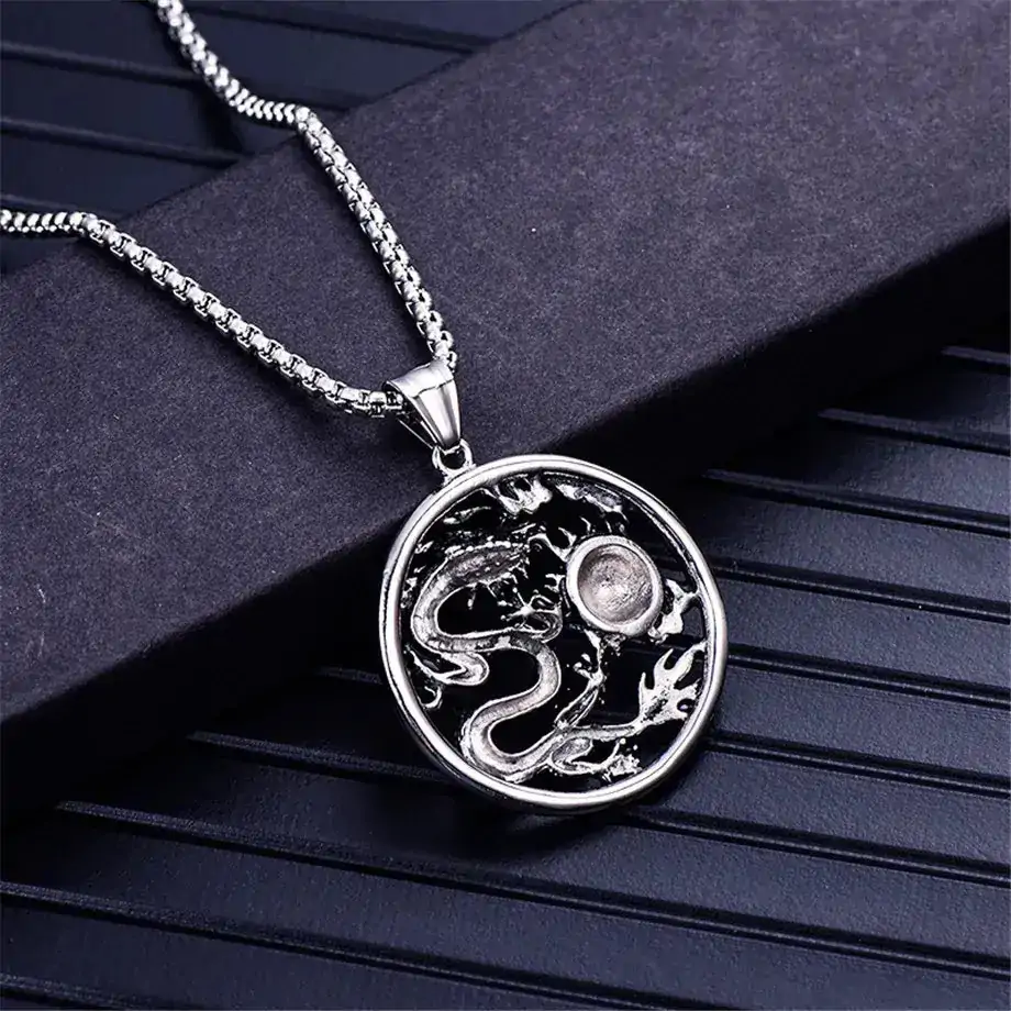 pendentifs amulettes pendentif rond dragon acier inoxy