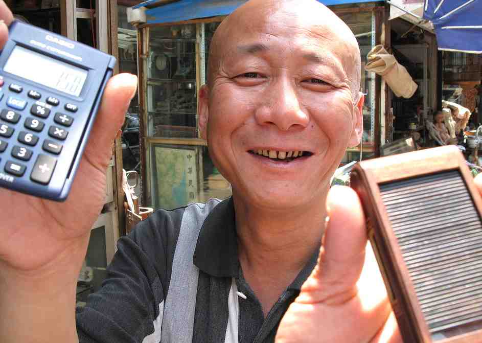 commercant-chinois-calculette-negociation
