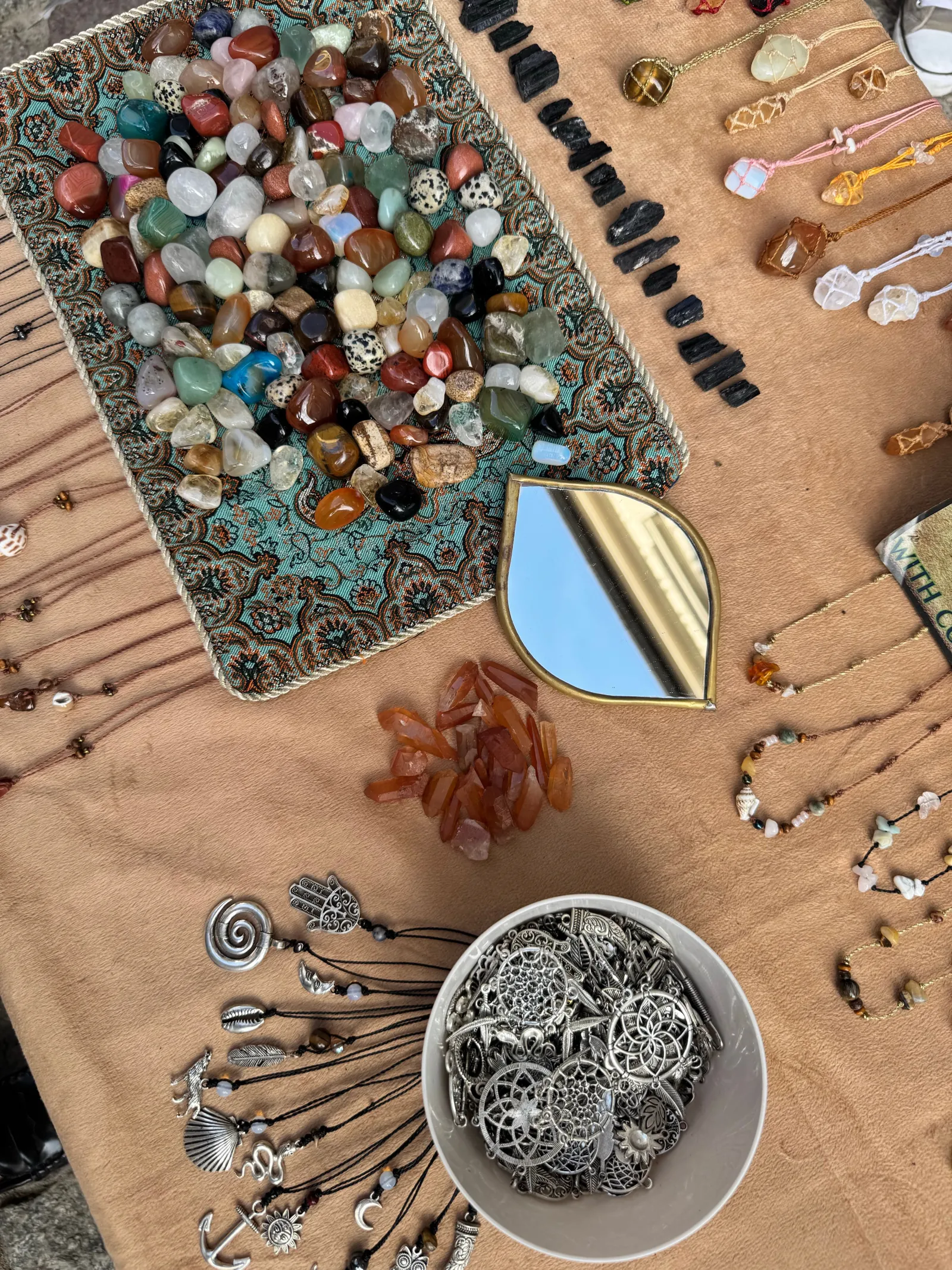 Jewelry workshop: silversmith working with natural stones — traditional handcraft process, Asia