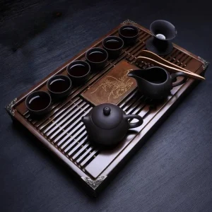 Chinese gongfu cha ceremony set with porcelain teapot tea strainer fairness pitcher four small teacups and bamboo tray