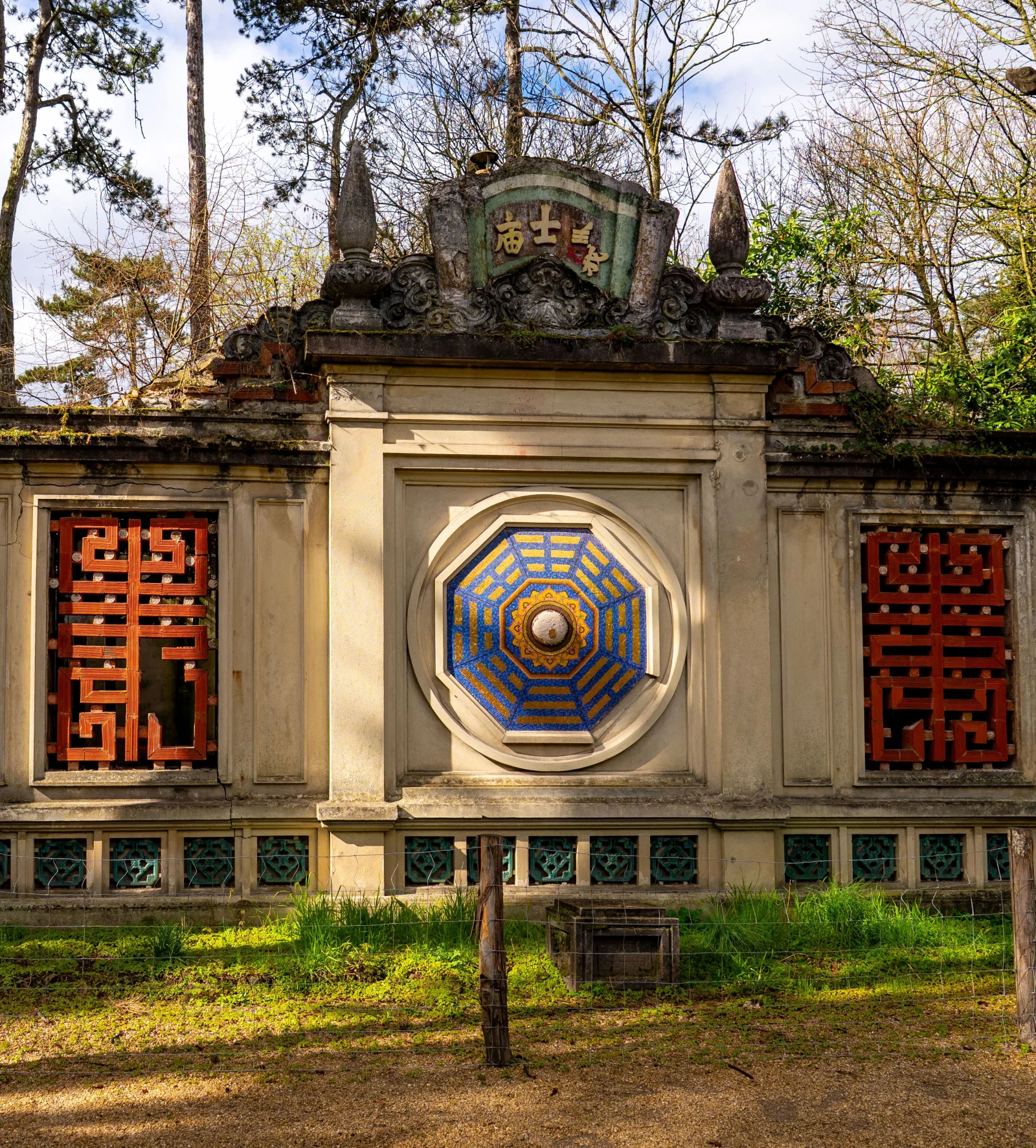 Facade of a Taoist temple with the Ba Gua symbol, eight trigrams, Chinese architecture