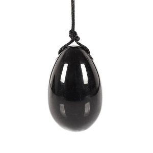 Pierre d'Obsidienne Noire Polie, Forme Ovoïde, Pierre d'obsidienne noire naturelle, polie à la main en forme ovoïde, surface brillante caractéristique du verre volcanique.